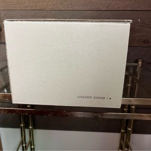 Golden goose box. No passport included. No tissue paper.